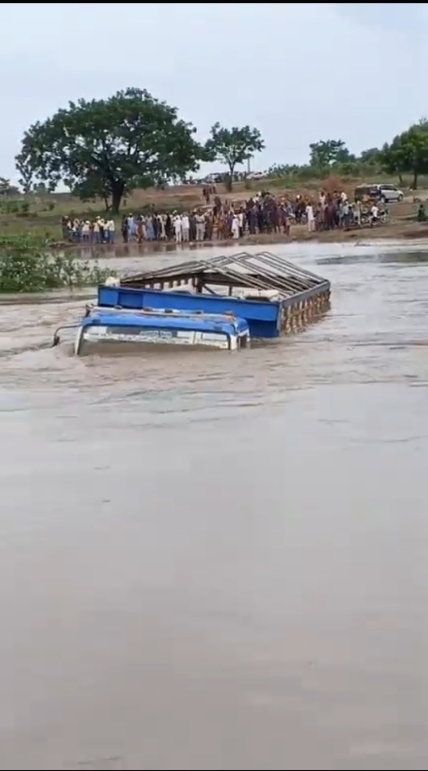 Flooding Submerges Collapsed Kwara Bridge, Strands Commuters